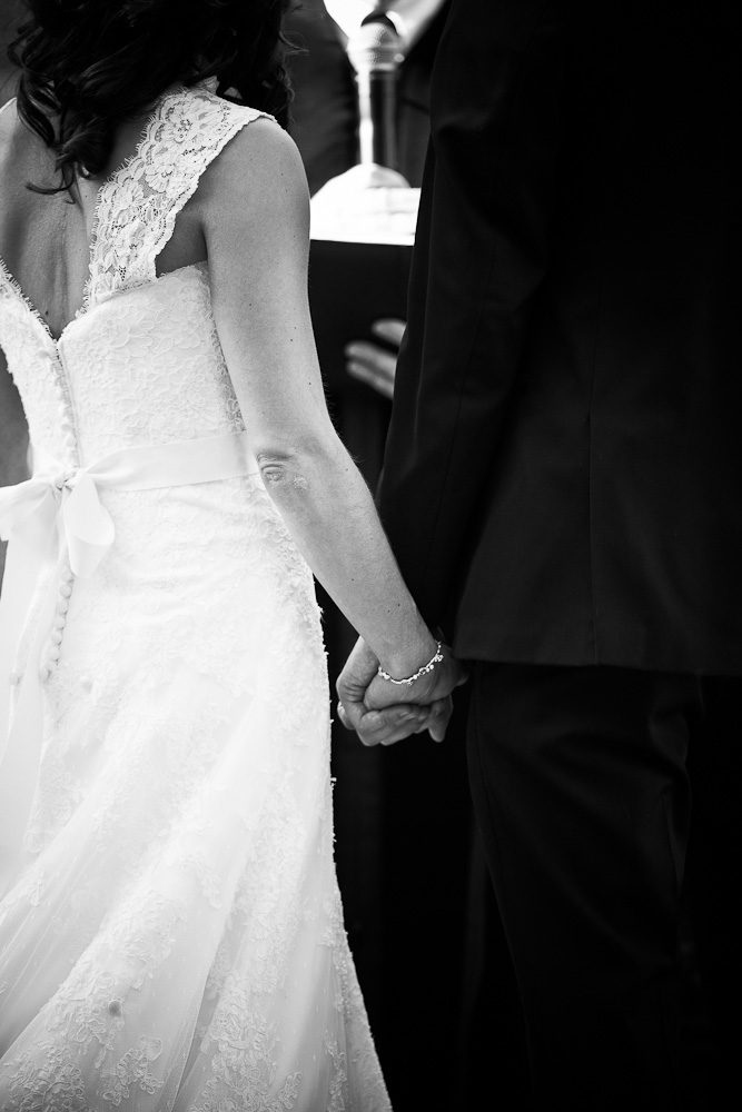 holding hands during the ceremony