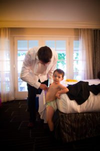 the ring bearer getting ready