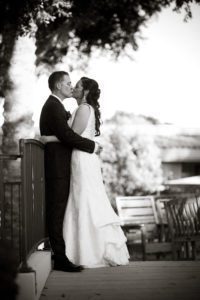 kissing during wedding photos